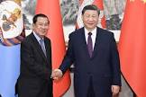 President Xi Meets Cambodian CPP President Hun Sen