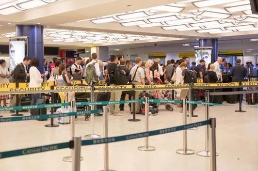 Travelers face hurdles at US airports with new health screenings to control coronavirus.